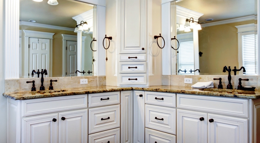 An image of cabinets over two sinks.